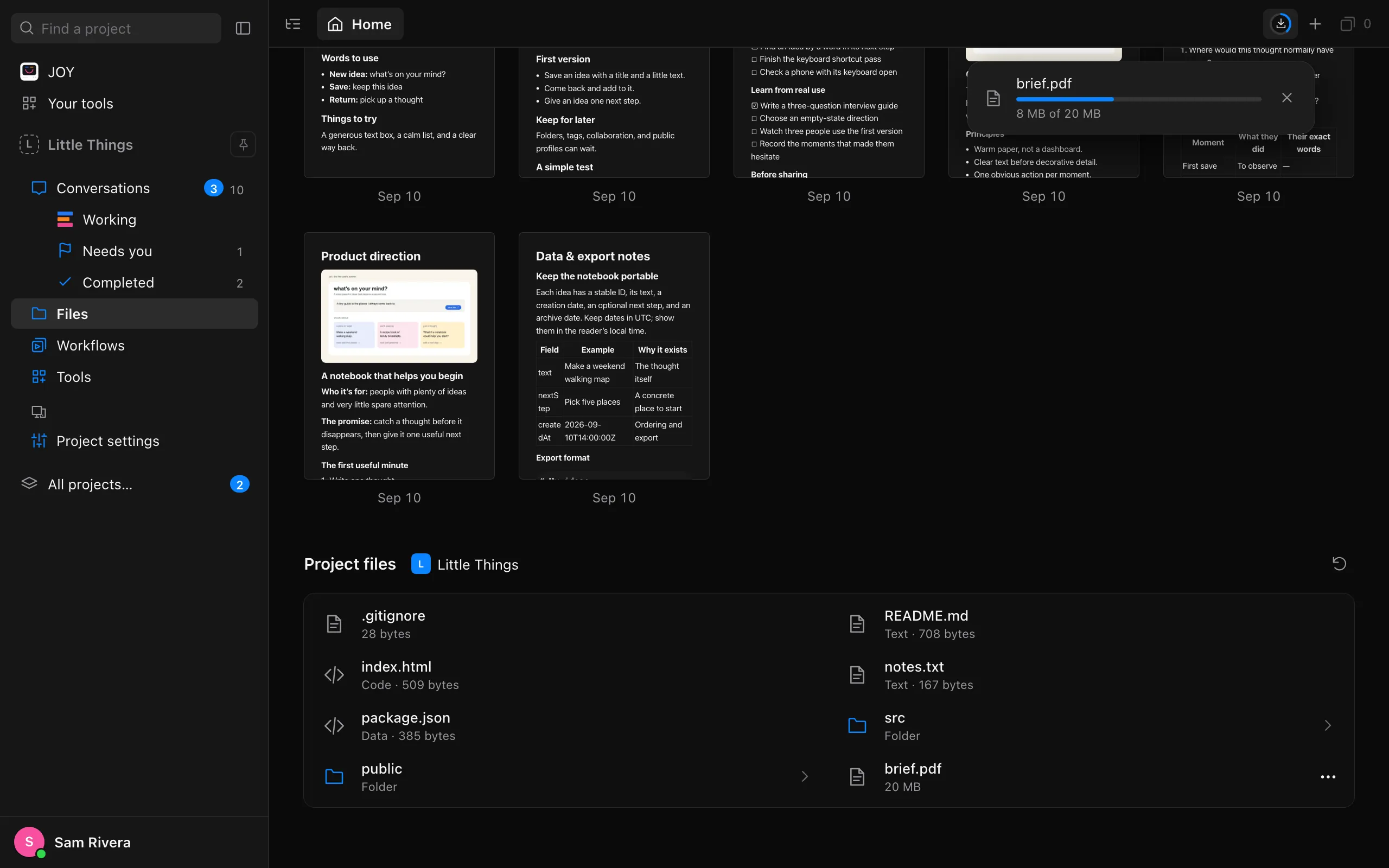The Downloads list open under its button at the top right of Files, with a file partway downloaded. Highlighted: Downloads.